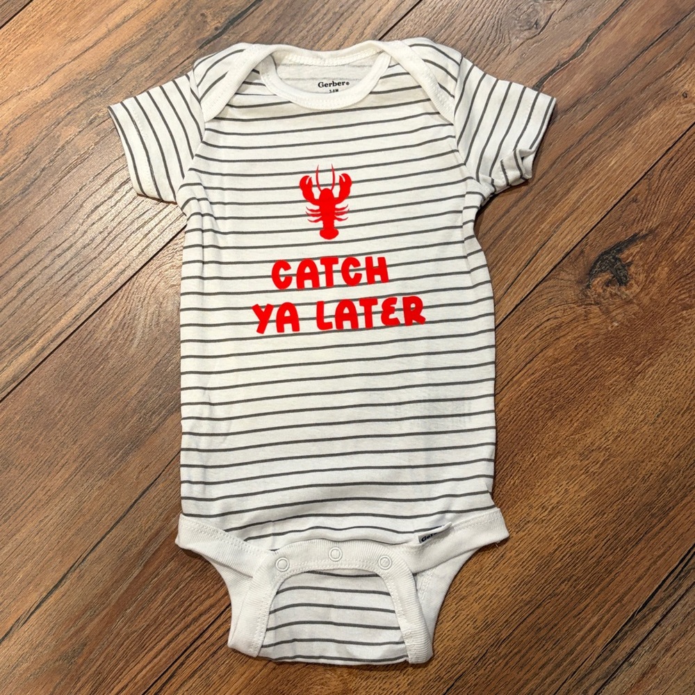 "Catch ya later" handmade onesie with lobster detail 🦞